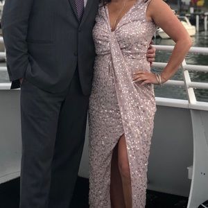 Sparkle party dress with a plunging neck and slit